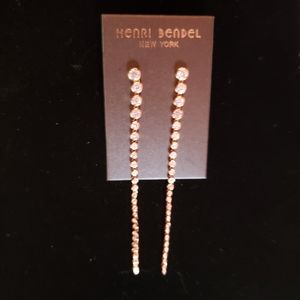 Henri Bedal long earrings.